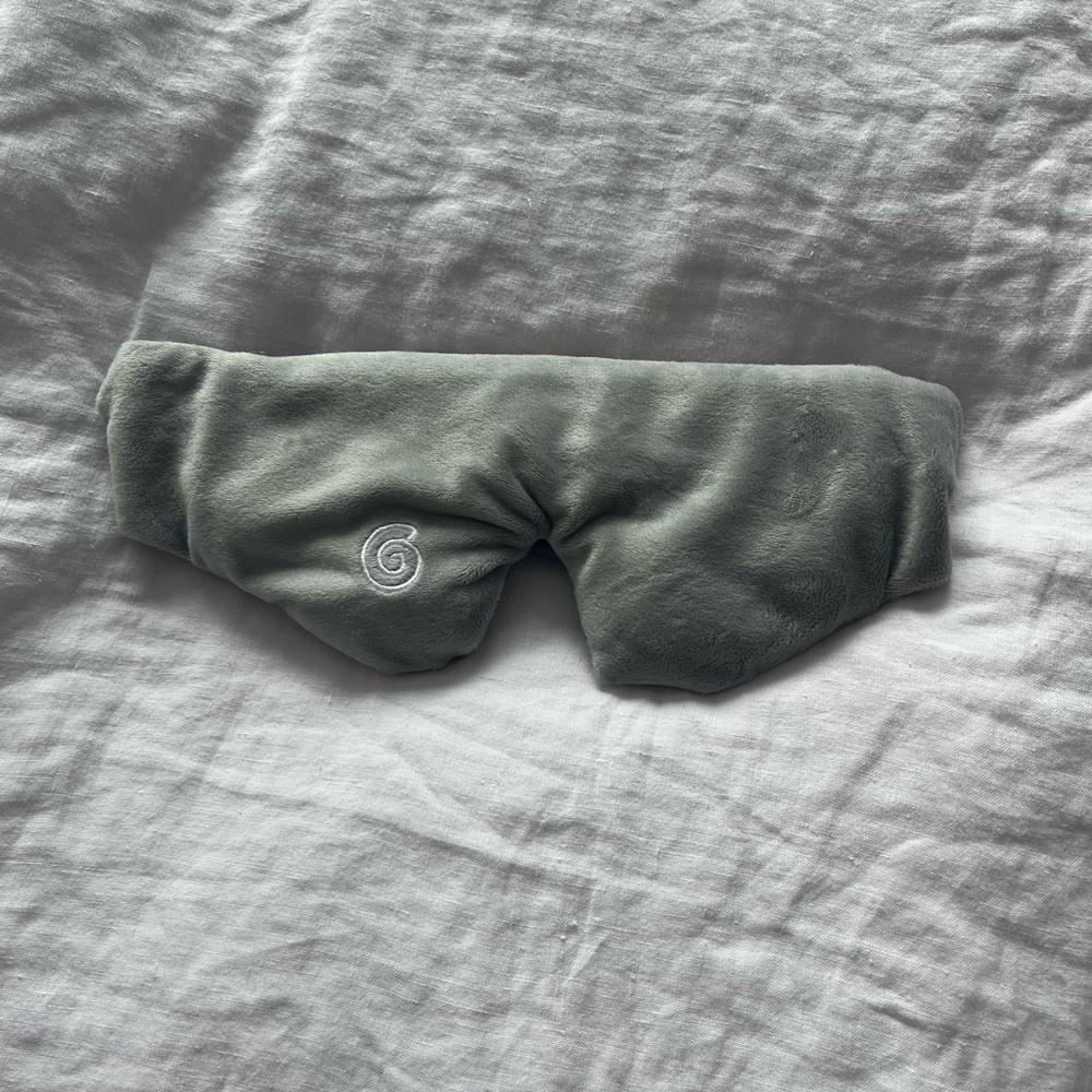 Gravity weighted sleep mask
